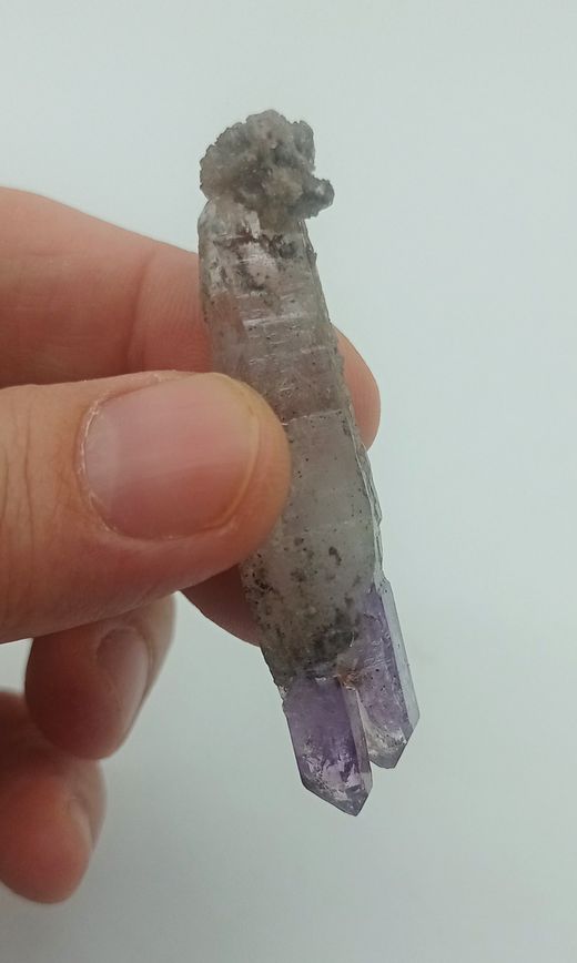Amatista ahumada biterminada