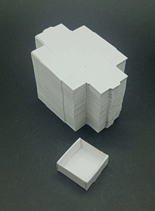 Caja plegable de cartón. 3x3 cm. Pack de 100 unidades