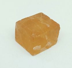 Calcita "Espato de Islandia" romboedro color miel