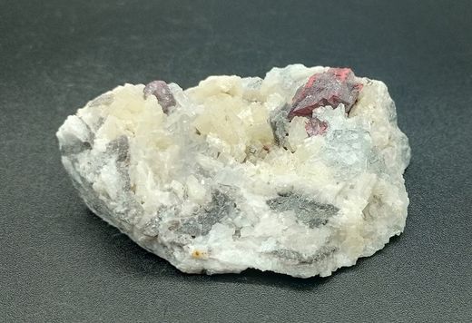Cinabrio (macla de penetración) con Dolomita