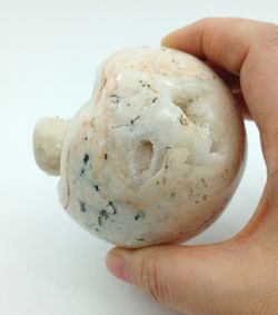 Esfera de Calcita con drusa de cristales