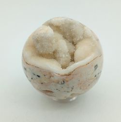Esfera de Calcita con drusa de cristales