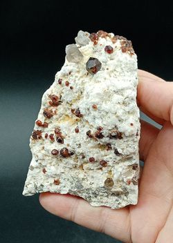 Espessartina (Granate) sobre Microclina