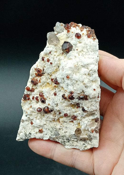Espessartina (Granate) sobre Microclina