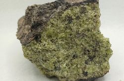 Olivino masa compacta