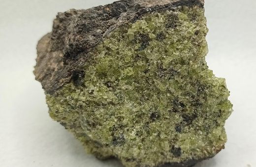 Olivino masa compacta