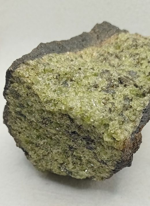 Olivino masa compacta