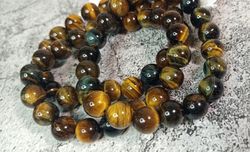 Pulsera "3 ojos" (Ojo de Tigre, Ojo de Buey, Ojo de Halcón) en bola de 10 mm