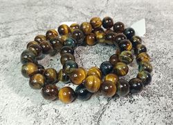 Pulsera "3 ojos" (Ojo de Tigre, Ojo de Buey, Ojo de Halcón) en bola de 10 mm