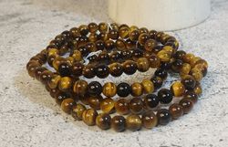 Pulsera Ojo de tigre bola 6 mm