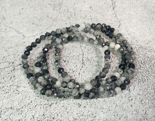 Pulsera de Cuarzo turmalinado facetado en 4 mm