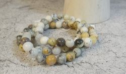 Pulsera de Merlinita bola 8 mm