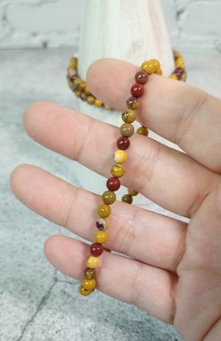 Pulseras de Mookaita bola 4mm