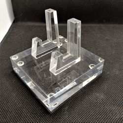 Soporte metacrilato 75x75x20 con 4 puntos de sujeción